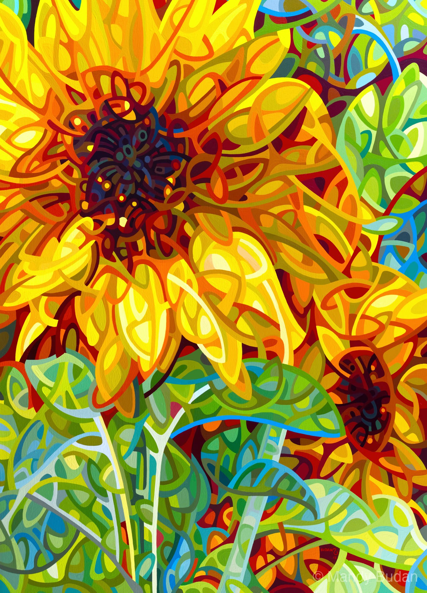 Nestled in the greens and blues of the summer garden, the sunflowers glow with joyful exuberance. by Mandy Budan
